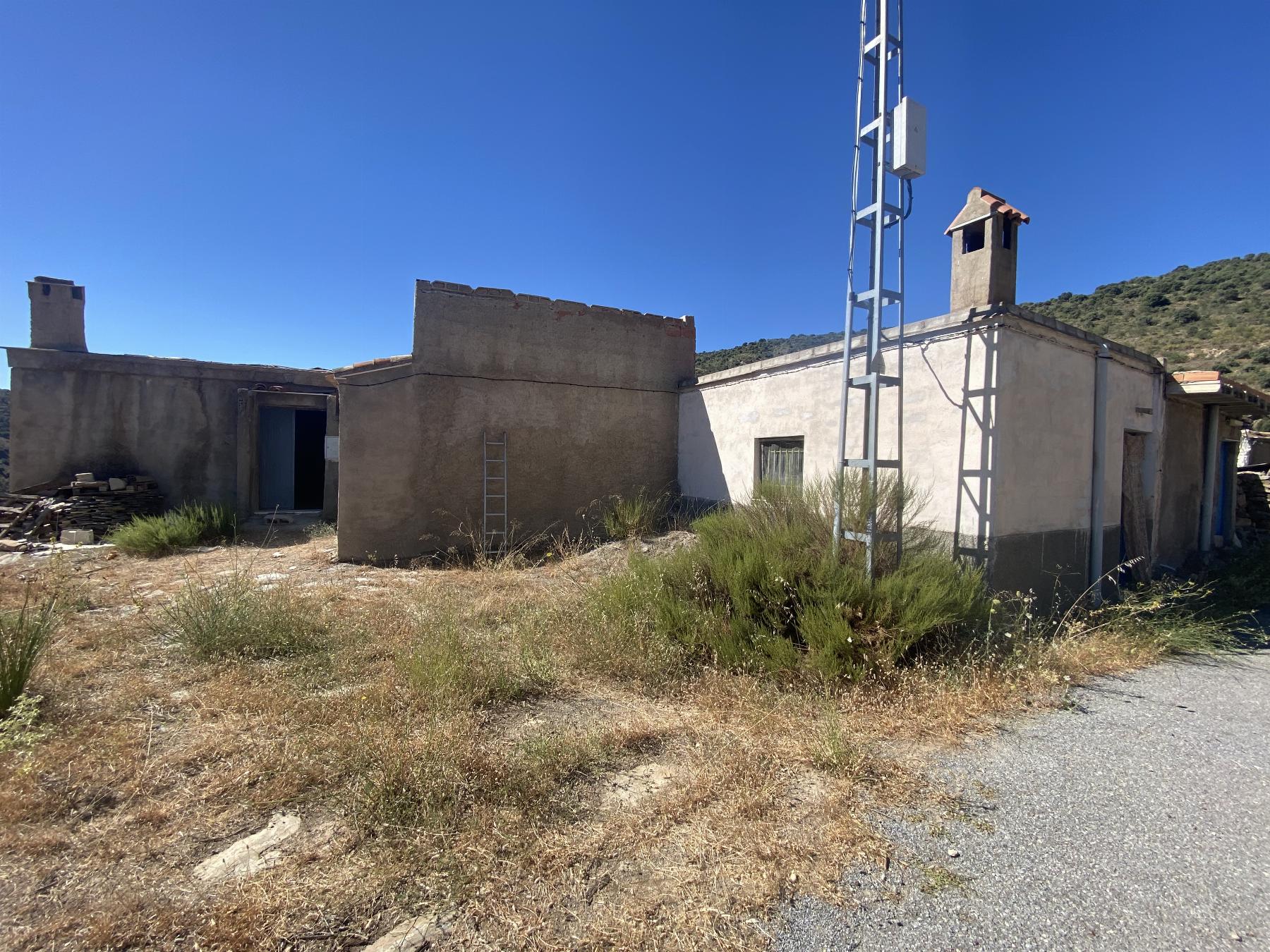Venta de finca rústica en Laroya