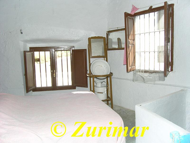 For share of house in Alcolea