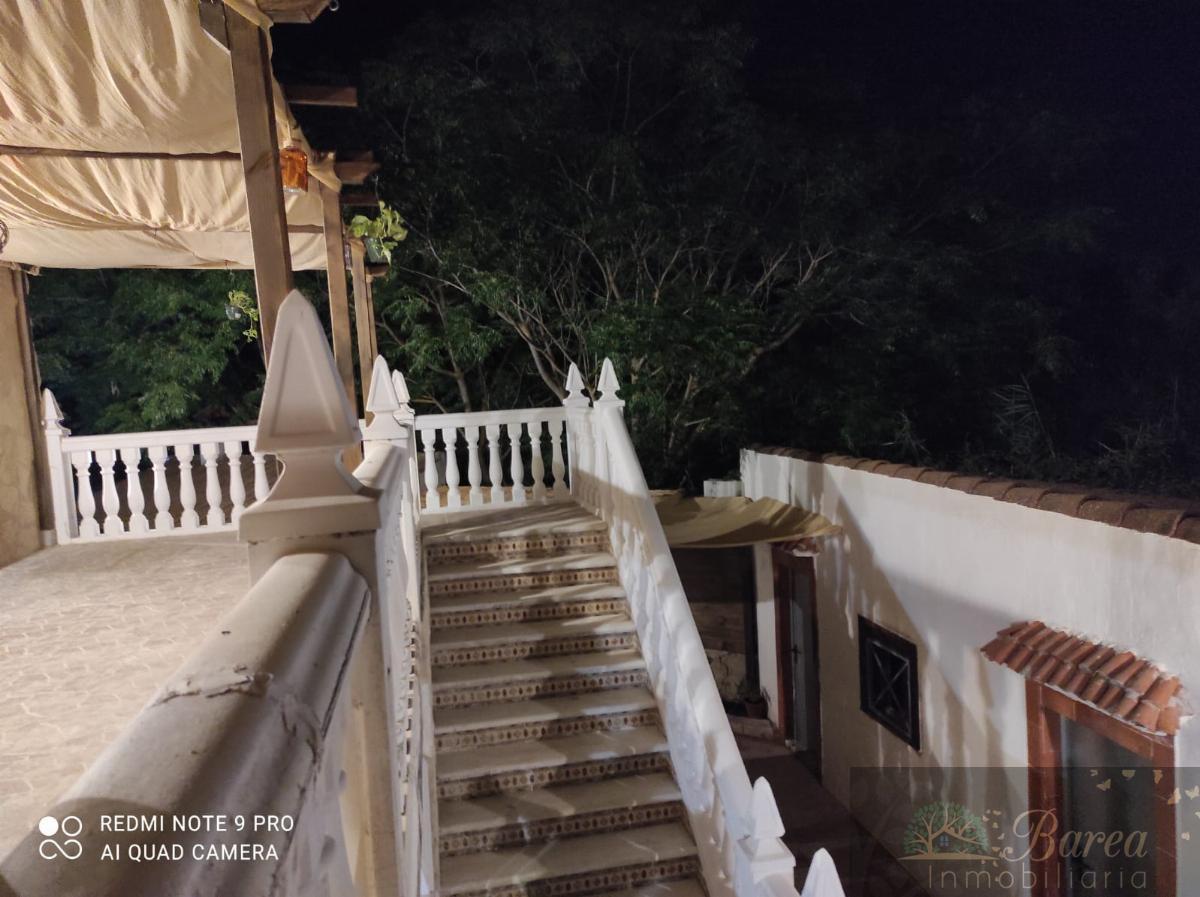 Köp av chalet i Cabra