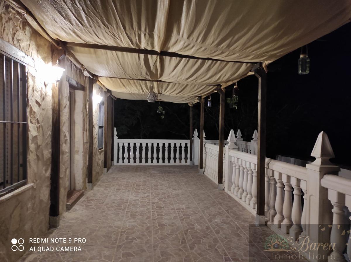 Köp av chalet i Cabra